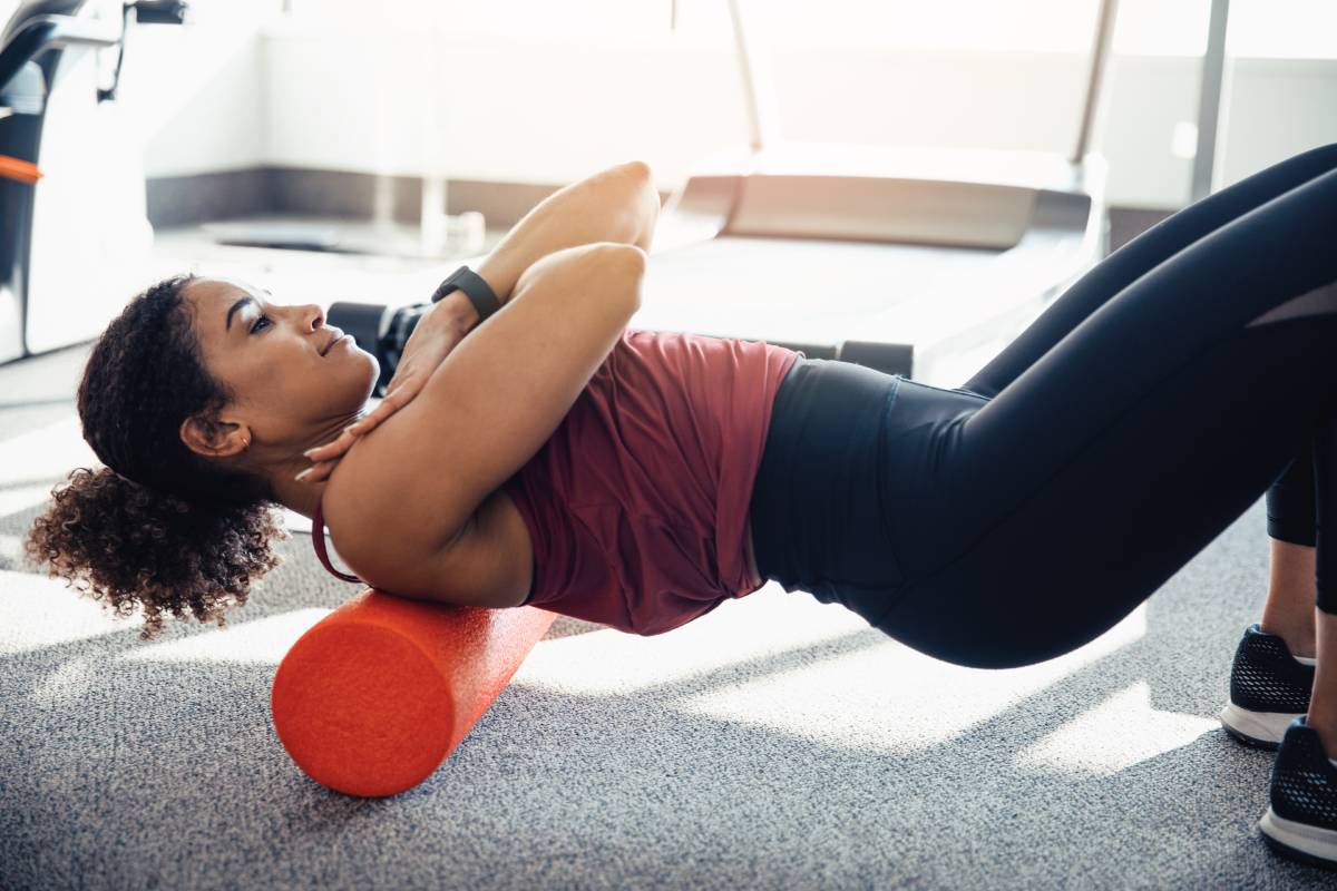 Image of person stretching their upper back